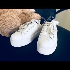 BCBG platform white/flowered sneakers.